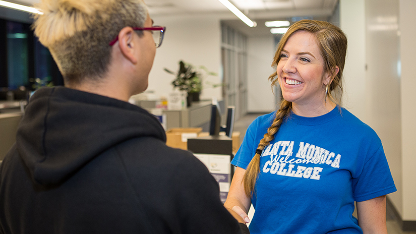 Counselor greeting student