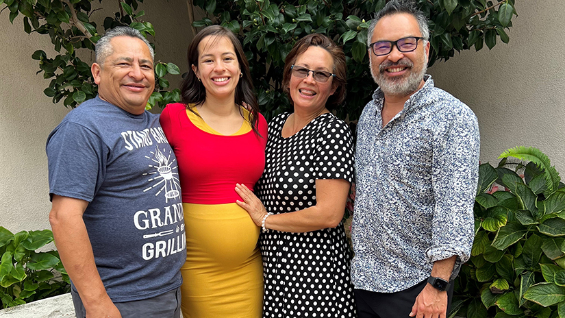 Lee with former student Daniela Lopez and family