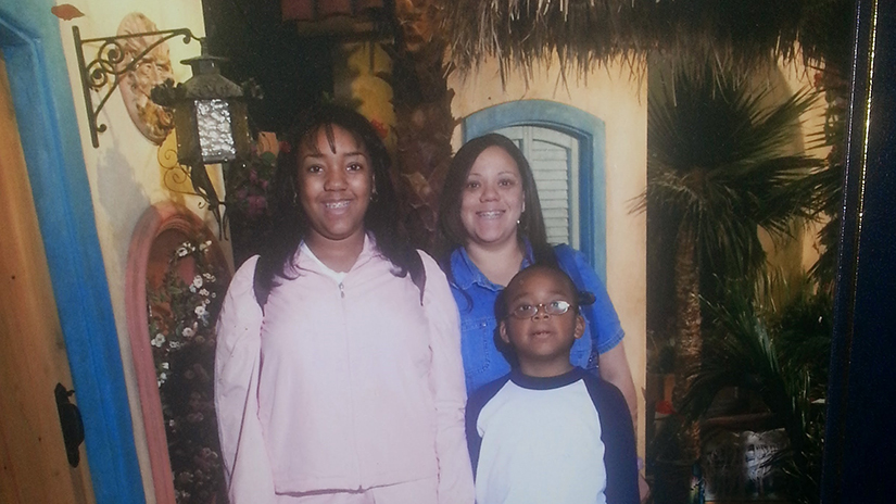 Ma'isha on a cruise with her children Deja and Akili