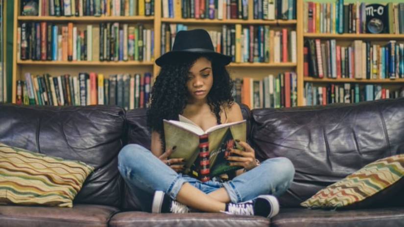 student at library